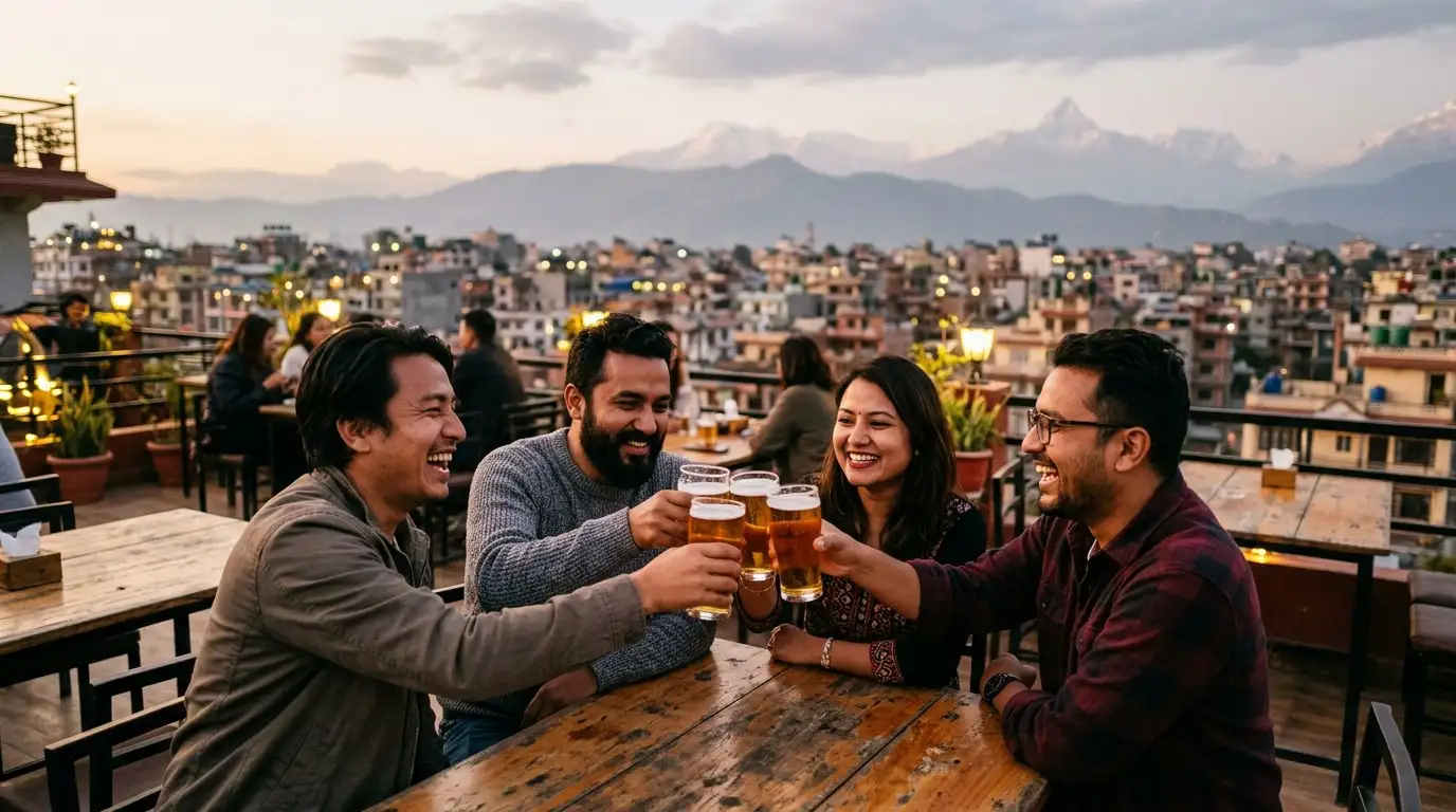 Friends toasting with beer on a Kathmandu rooftop